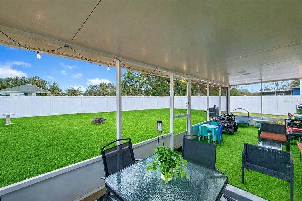 14908 Southwest 46th Circle Ocala, FL 34473 - Photo 46 of 46 a view of a garden with couches potted plants and a garden