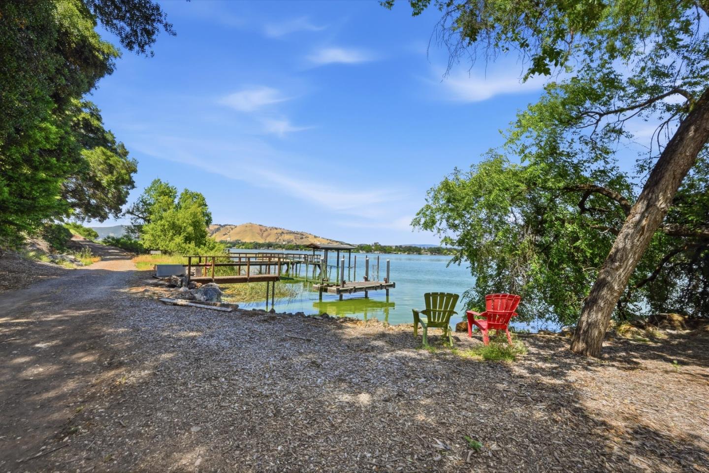 5156 Lake Road Lower Lake, CA 95457 - Photo 26 of 27 a view of a backyard with a small cabin