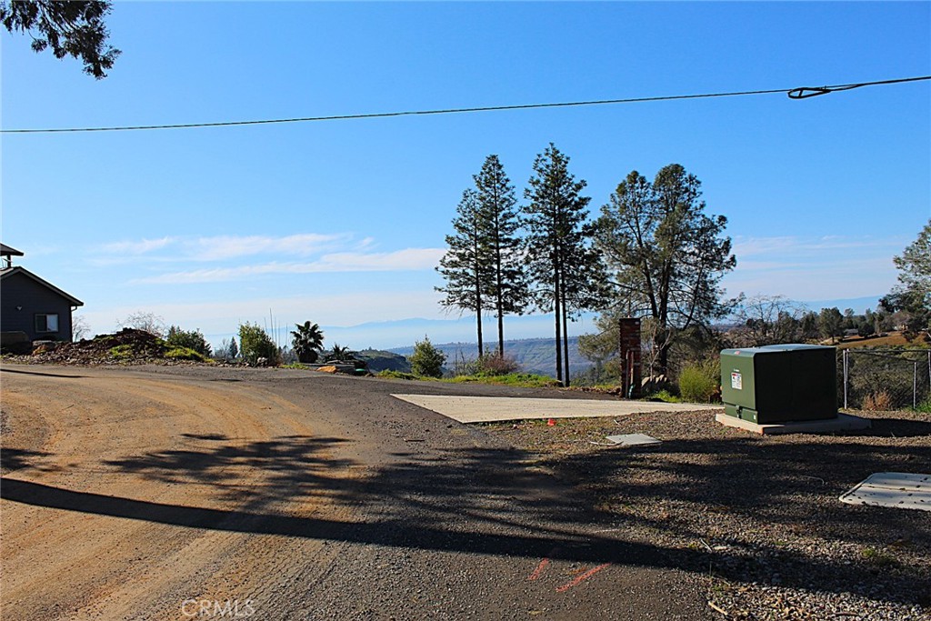 a view of a road with an ocean view