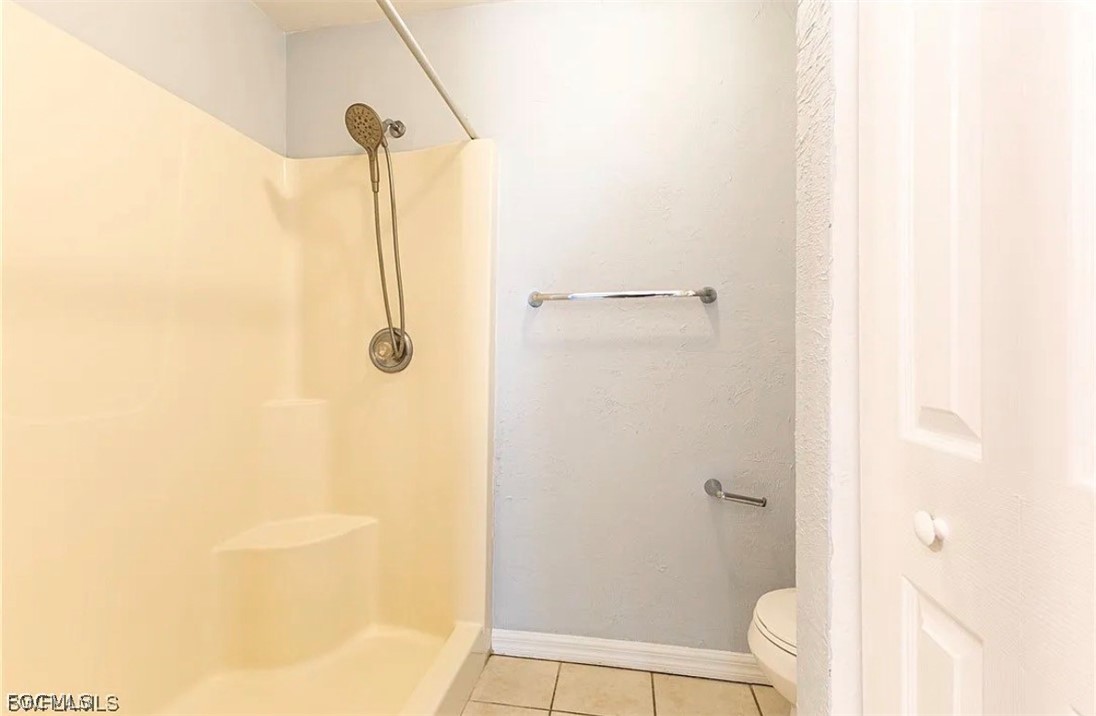4716 1st Street Southwest Lehigh Acres, FL 33973 - Photo 15 of 20 a bathroom with a shower