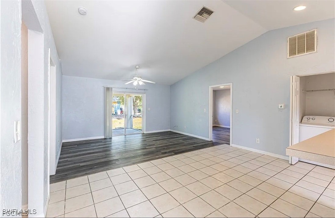 4716 1st Street Southwest Lehigh Acres, FL 33973 - Photo 17 of 20 a view of an empty room and window