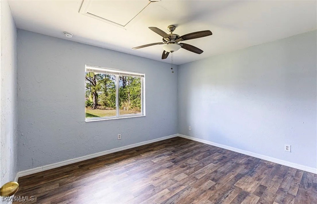 4716 1st Street Southwest Lehigh Acres, FL 33973 - Photo 8 of 20 a view of an empty room with a window