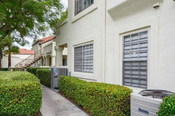 a view of a back yard of the house