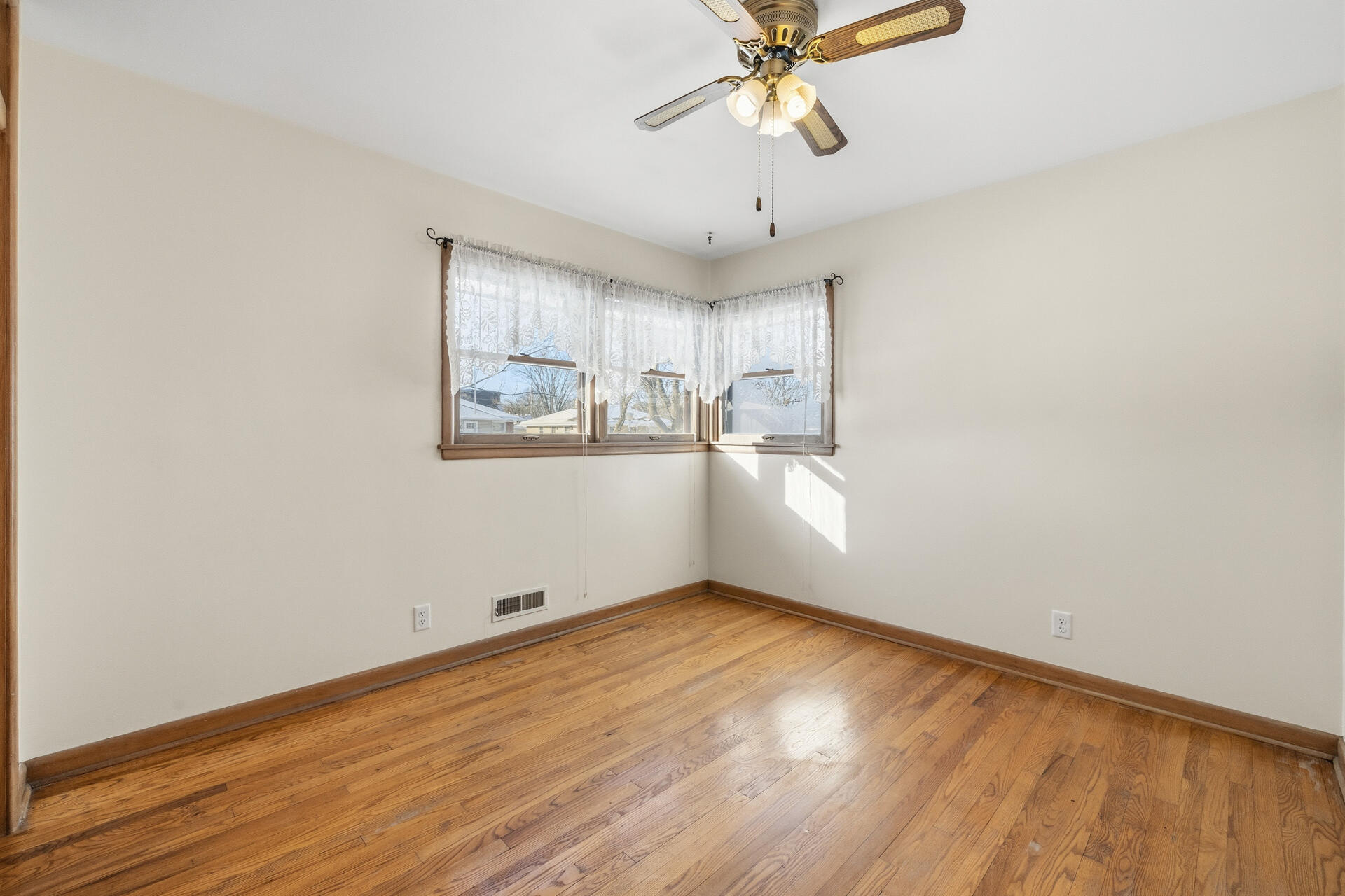 4134 North 80th Street Milwaukee, WI 53222 - Photo 12 of 28 Primary Bedroom with oak hard wood floors
