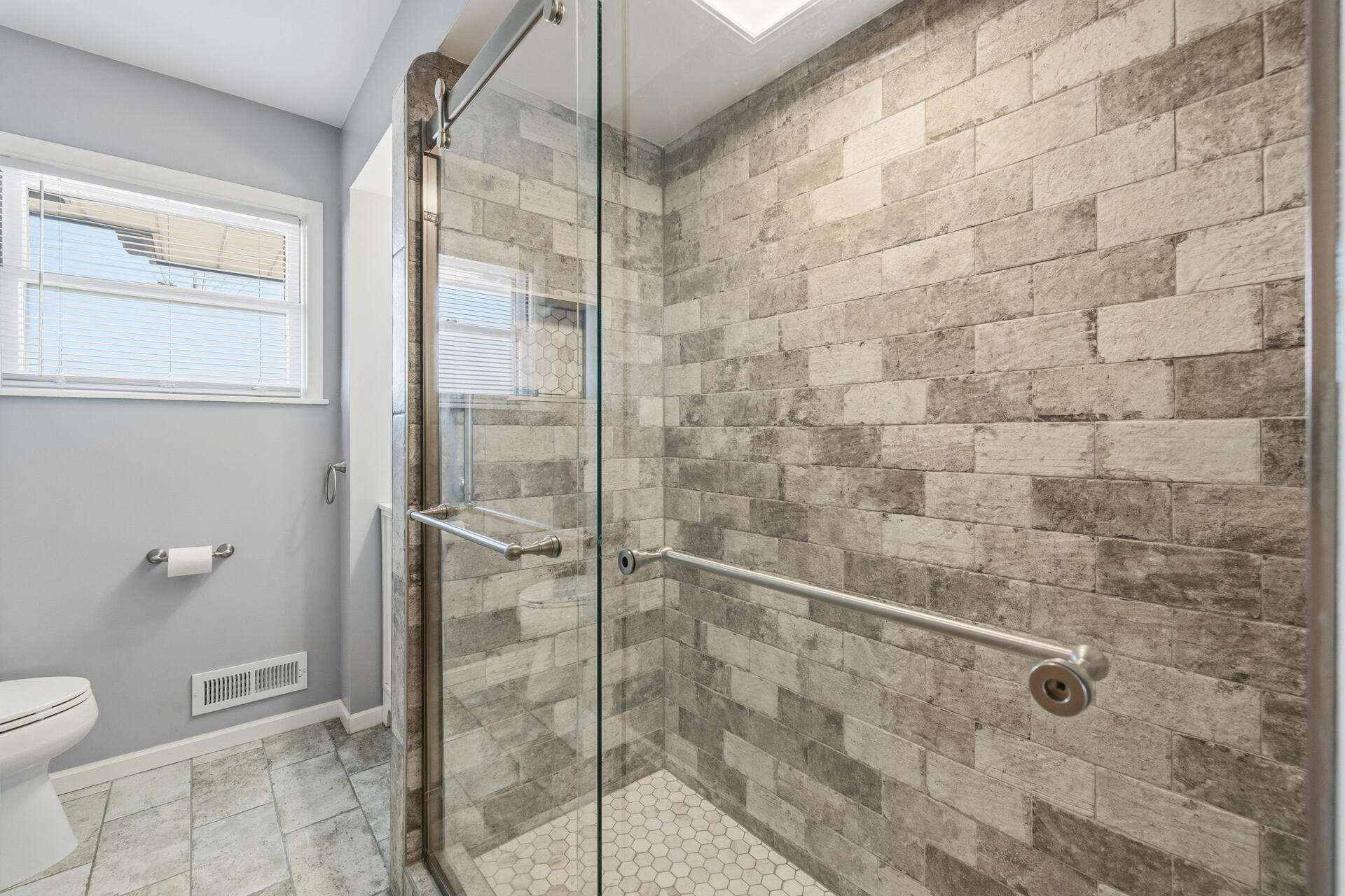 4134 North 80th Street Milwaukee, WI 53222 - Photo 17 of 28 completely updated beautiful bath with walk in floor to ceiling tile