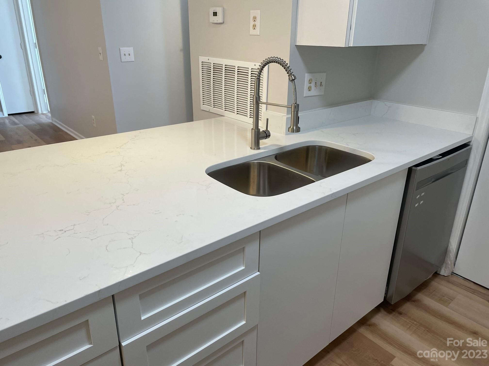 11011 Harrowfield Road Charlotte, NC 28226 - Photo 2 of 24 a close view of sink and tap