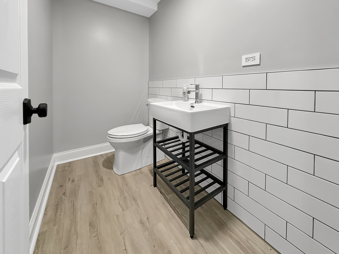 18444 Clyde Road Homewood, IL 60430 - Photo 25 of 31 a bathroom with a sink toilet and mirror