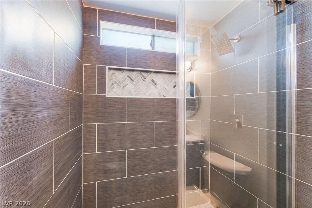 3597 Bronco Road Las Vegas, NV 89103 - Photo 27 of 43 Bathroom featuring a shower stall