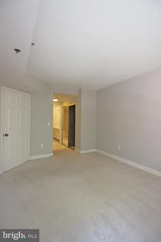 a bathroom with a toilet and shower