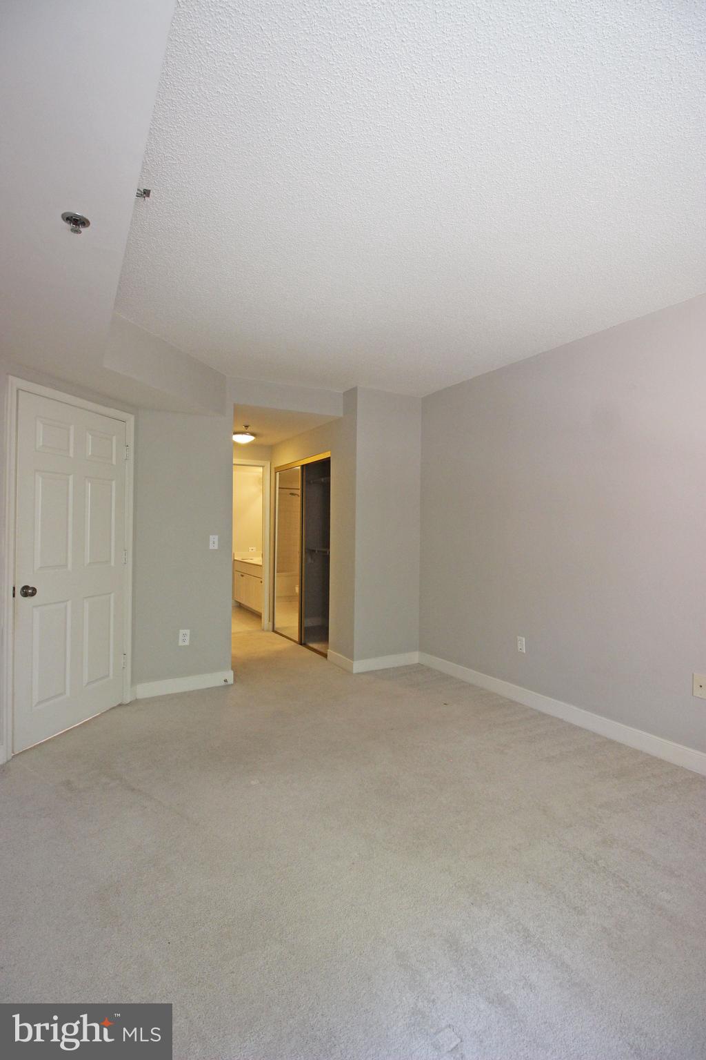 1045 North Utah Street, Unit 108 Arlington, VA 22203 - Photo 15 of 22 a view of an empty room with a window