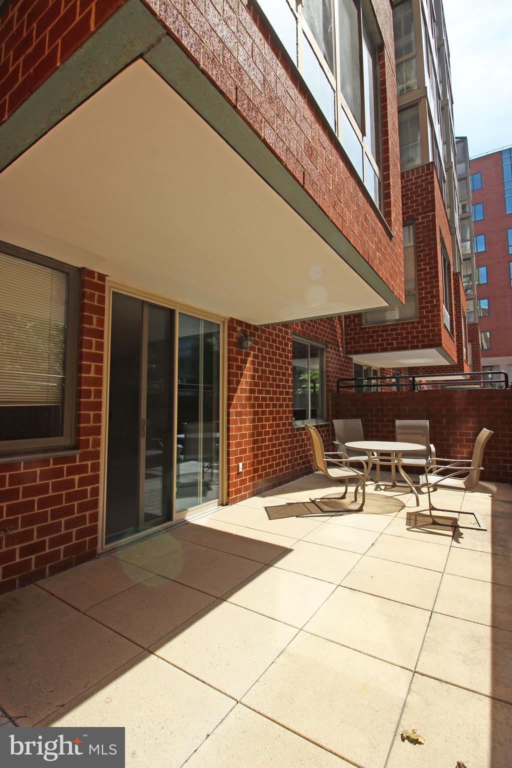 1045 North Utah Street, Unit 108 Arlington, VA 22203 - Photo 21 of 22 a view of pool with outdoor seating