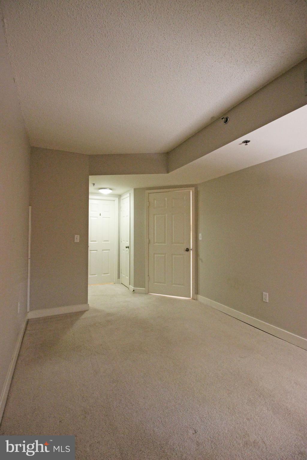 1045 North Utah Street, Unit 108 Arlington, VA 22203 - Photo 9 of 22 a view of an empty room