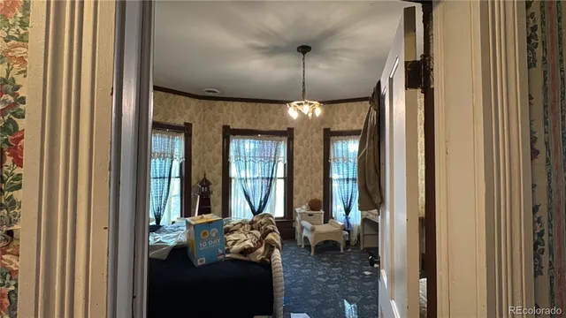 a view of a livingroom with furniture and window