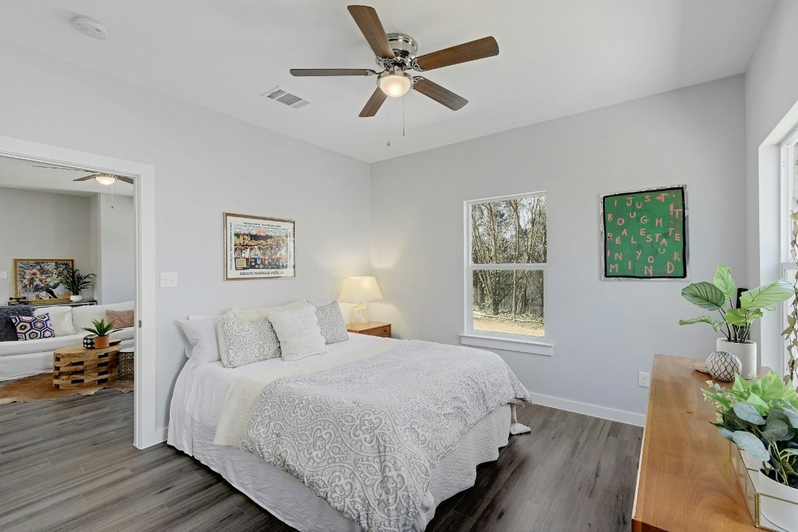 14922 Running Deer Trail Austin, TX 78734 - Photo 23 of 31 a bedroom with a large bed and a window