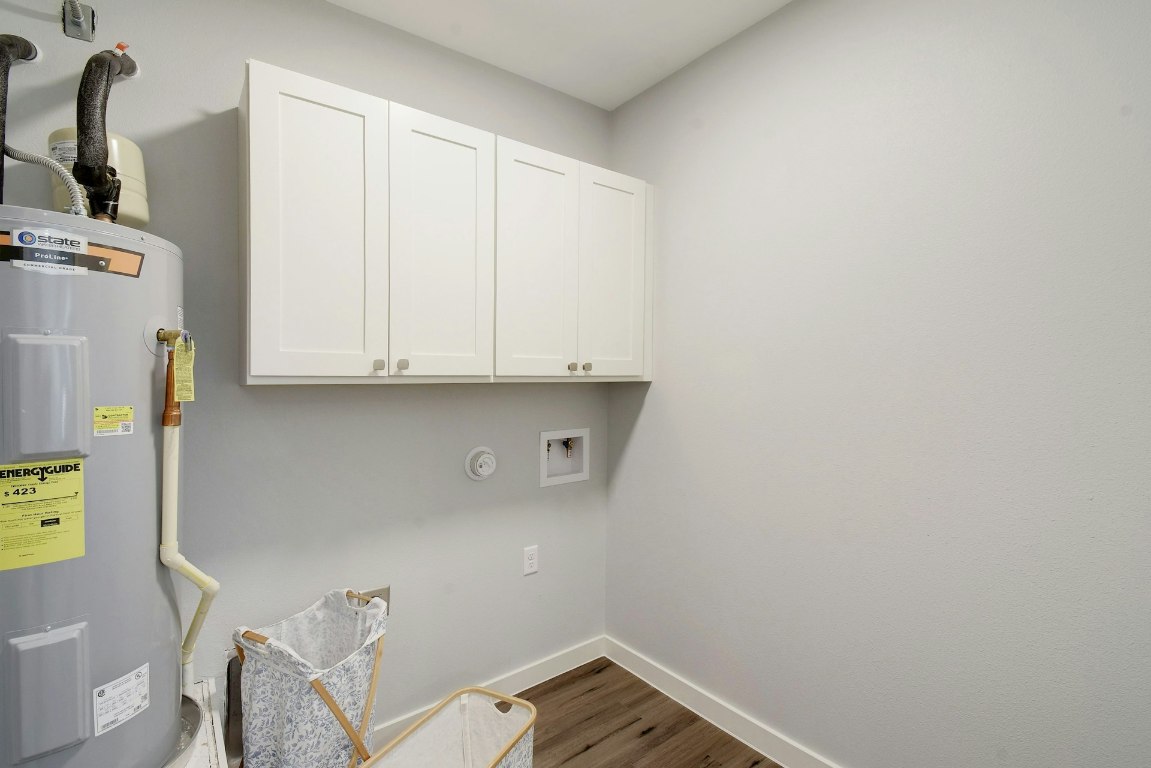 14922 Running Deer Trail Austin, TX 78734 - Photo 31 of 31 a bathroom with a sink and toilet