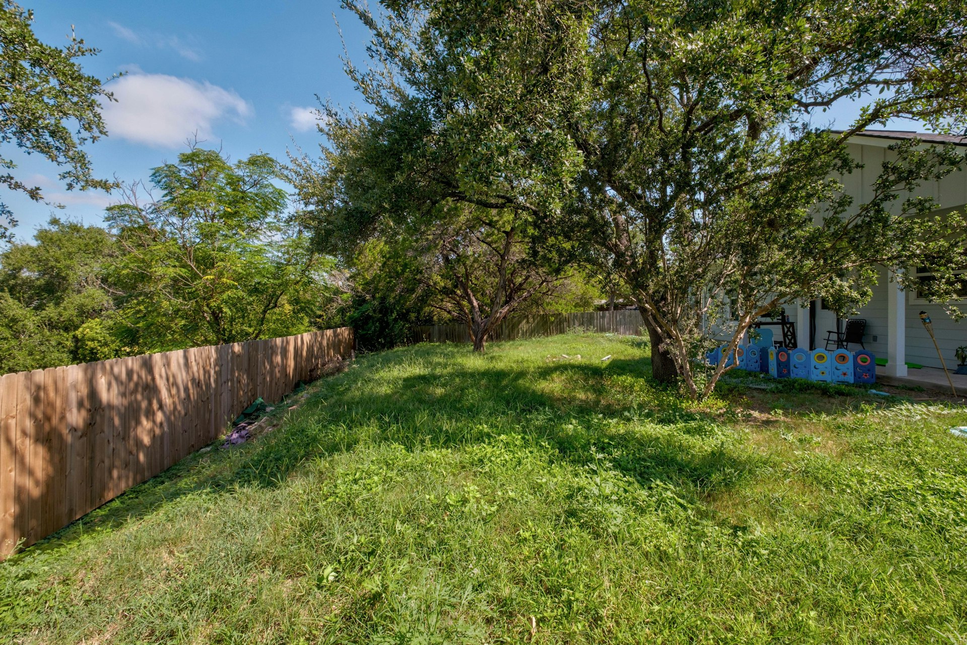 14922 Running Deer Trail Austin, TX 78734 - Photo 4 of 31 View of yard with a fenced backyard