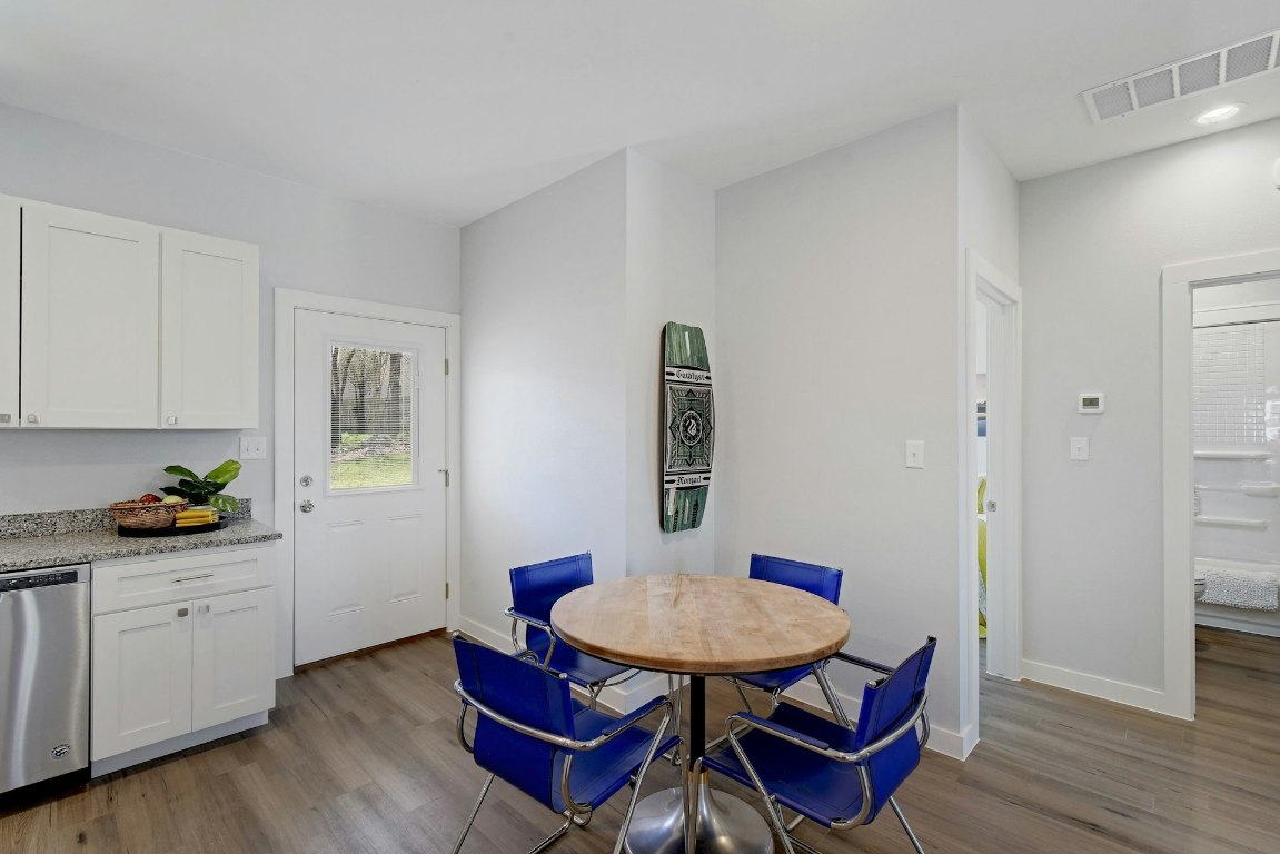 14922 Running Deer Trail Austin, TX 78734 - Photo 20 of 31 a view of a room with furniture and wooden floor
