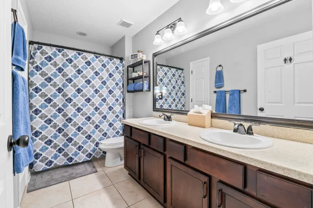 a room with toys and a baby crib