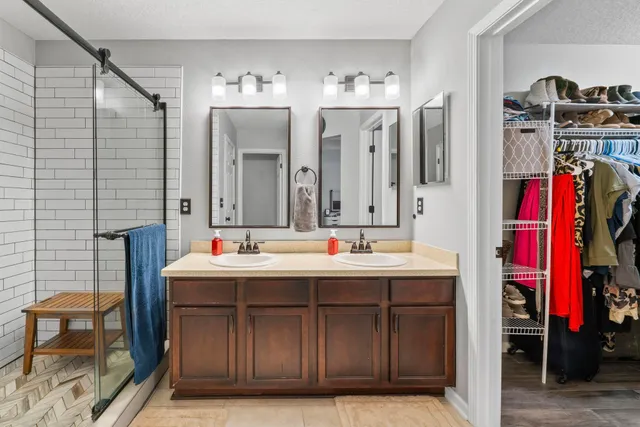 a view of a house with backyard porch and sitting area