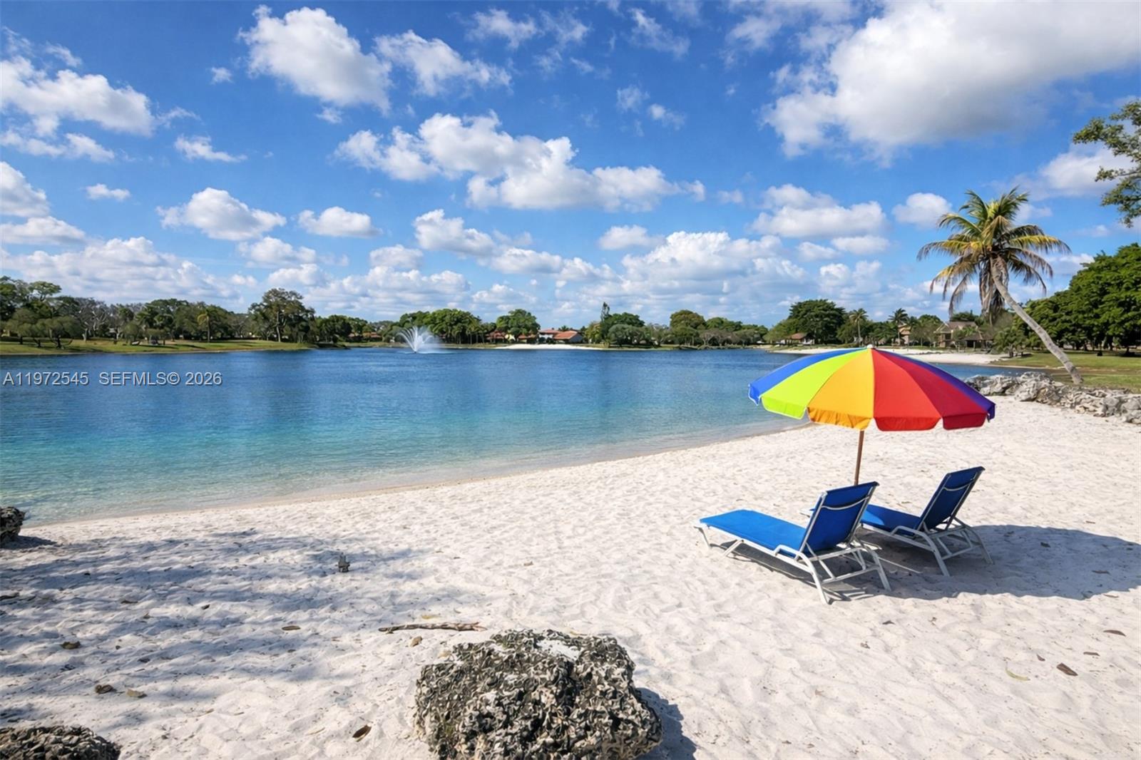 15285 Southwest 107th Lane, Unit 201 Miami, FL 33196 - Photo 2 of 28 a view of a lake with a outdoor space
