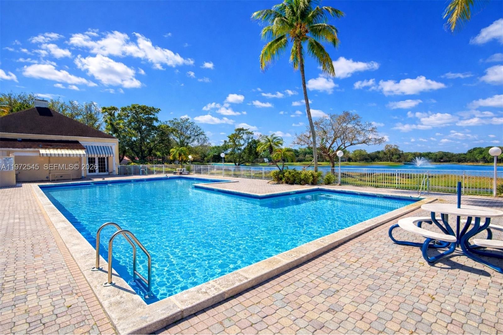 15285 Southwest 107th Lane, Unit 201 Miami, FL 33196 - Photo 4 of 28 swimming pool with an outdoor seating