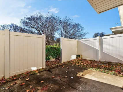 a view of a backyard of the house