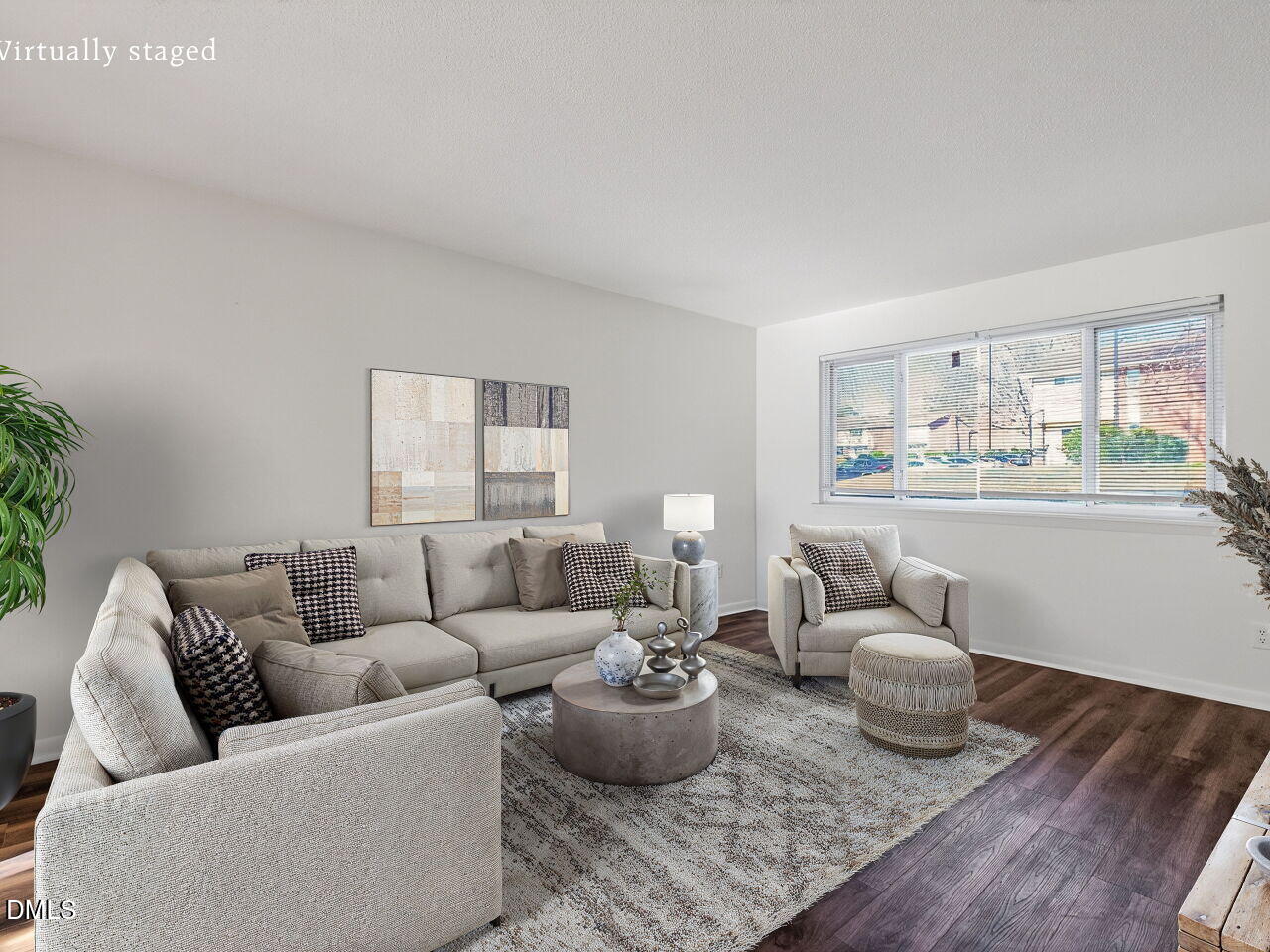2304 Champion Court, Unit 2304 Raleigh, NC 27606 - Photo 9 of 35 a living room with furniture and a large window