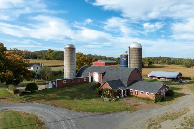 a view of a chairs and table in the patio