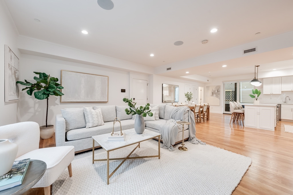 a living room with furniture and a table