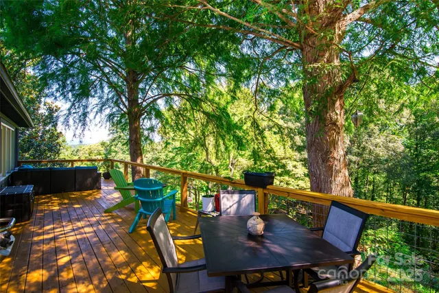 a view of a chairs and table in patio