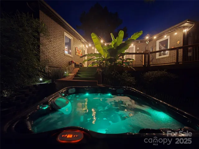 a view of a chairs and table in the garden