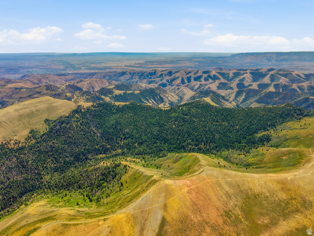10780 Ford Ridge Road Helper, UT 84526 - Photo 1 of 38 Expansive landscape featuring rolling hills and mountainous terrain with varied elevations