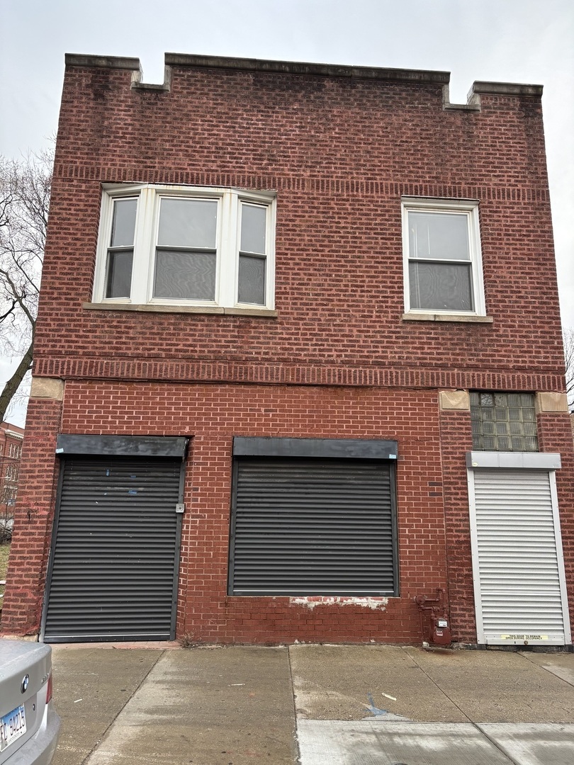 539 West 119th Street Chicago, IL 60628 - Photo 1 of 19 a front view of a building
