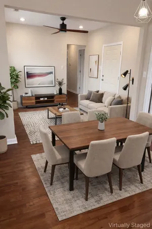 a view of a dining room with furniture