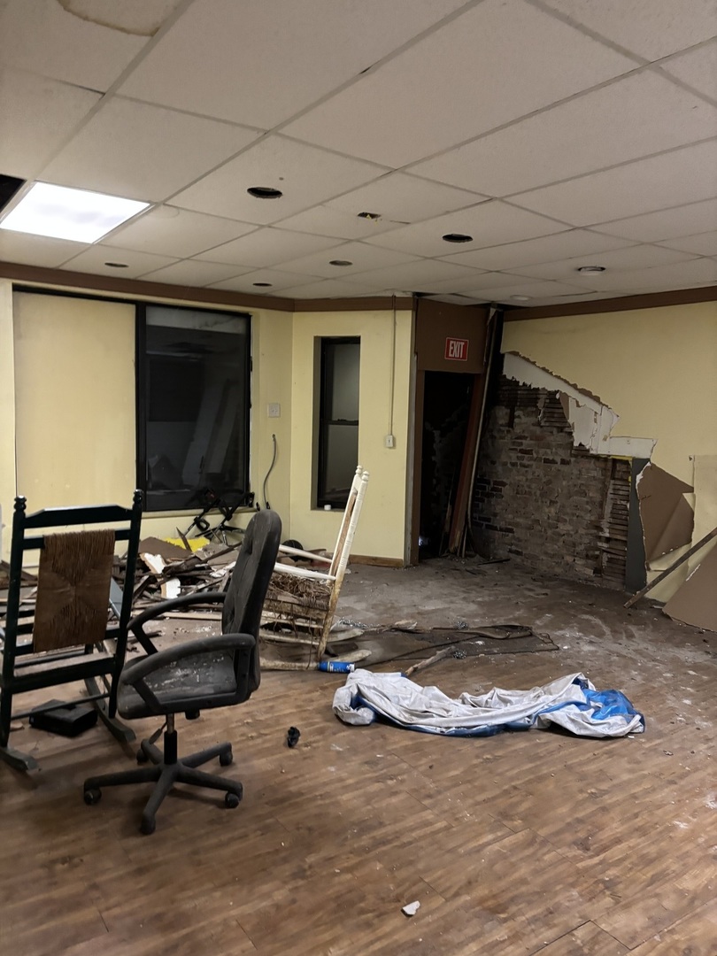 539 West 119th Street Chicago, IL 60628 - Photo 2 of 19 a view of a room with gym equipment