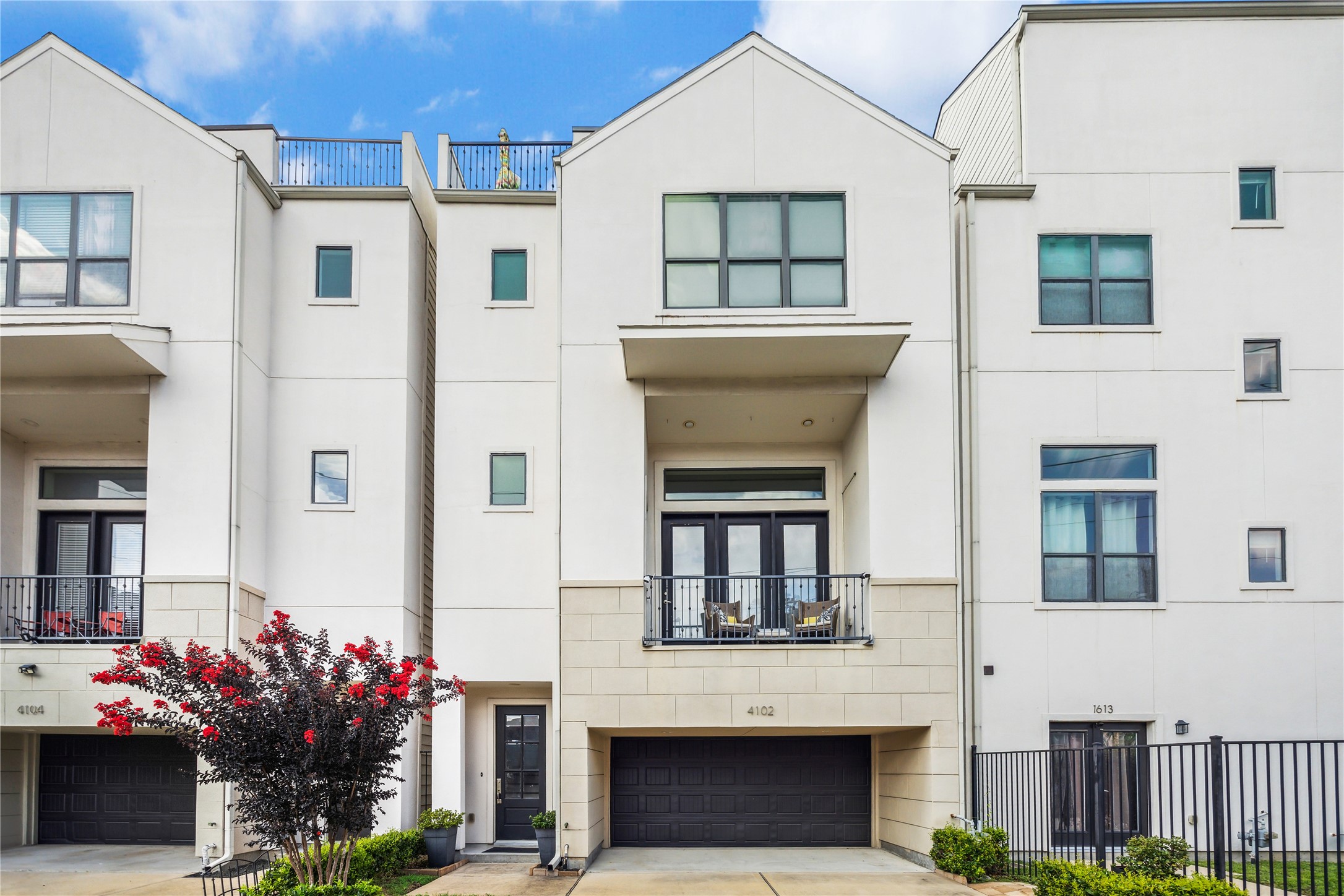 4102 Marina Street Houston, TX 77007 - Photo 1 of 23 a front view of a house with a yard and outdoor seating