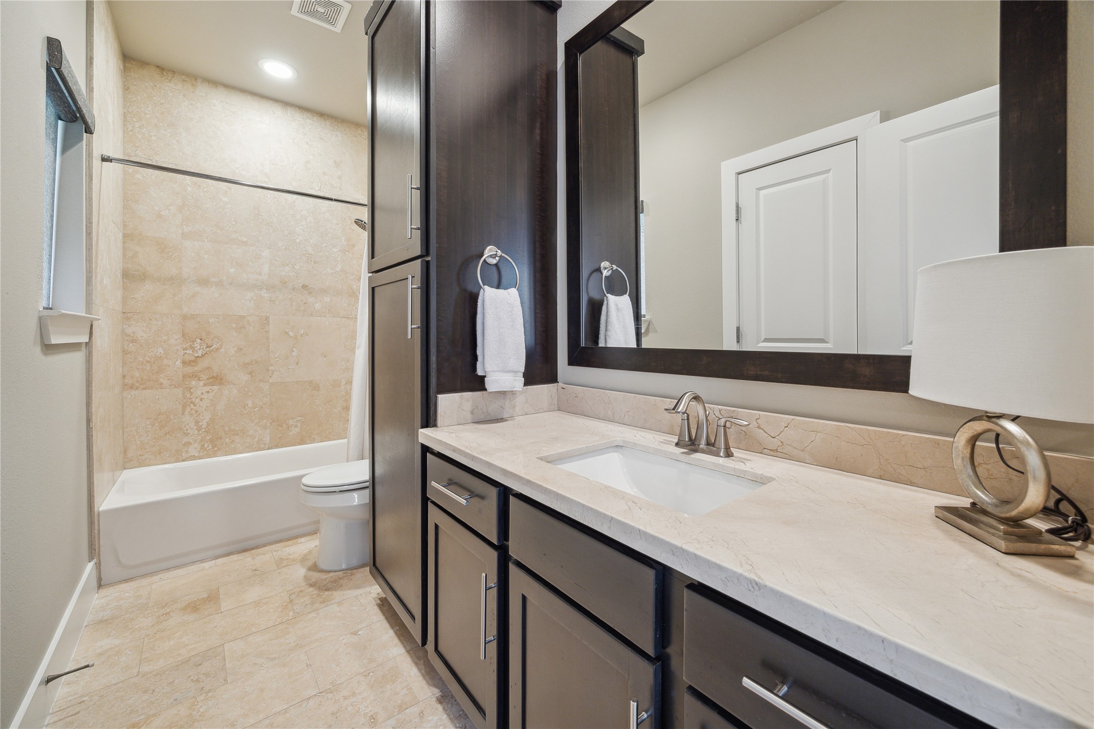 4102 Marina Street Houston, TX 77007 - Photo 4 of 23 a bathroom with a sink and a mirror