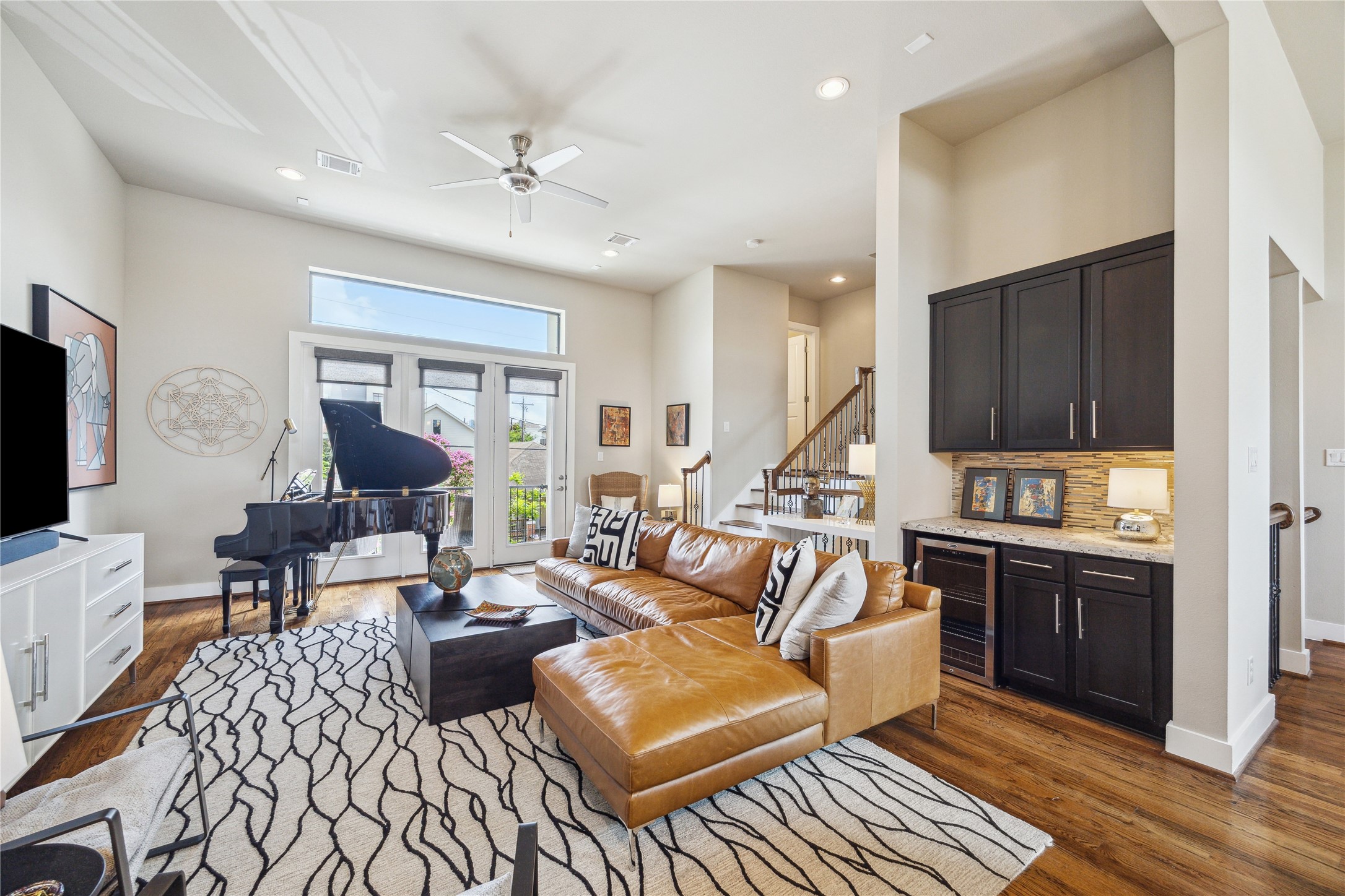 4102 Marina Street Houston, TX 77007 - Photo 8 of 23 a living room with furniture and a flat screen tv