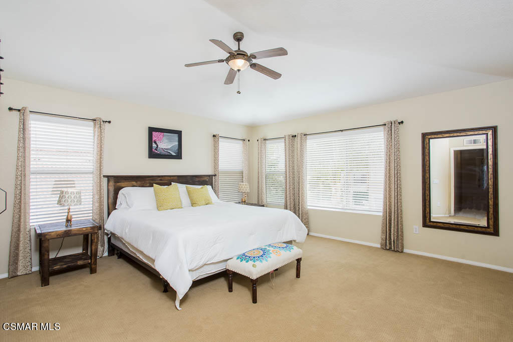 1902 Winterdew Avenue Simi Valley, CA 93065 - Photo 17 of 29 a spacious bedroom with a bed and a window