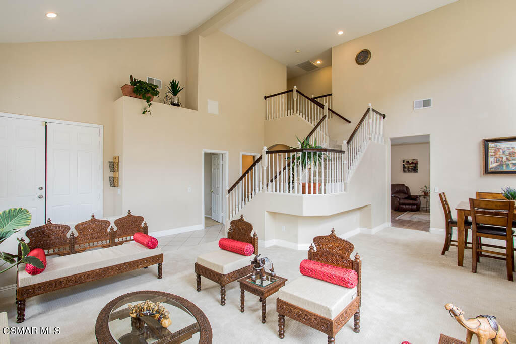 1902 Winterdew Avenue Simi Valley, CA 93065 - Photo 3 of 29 a living room with furniture and flowers
