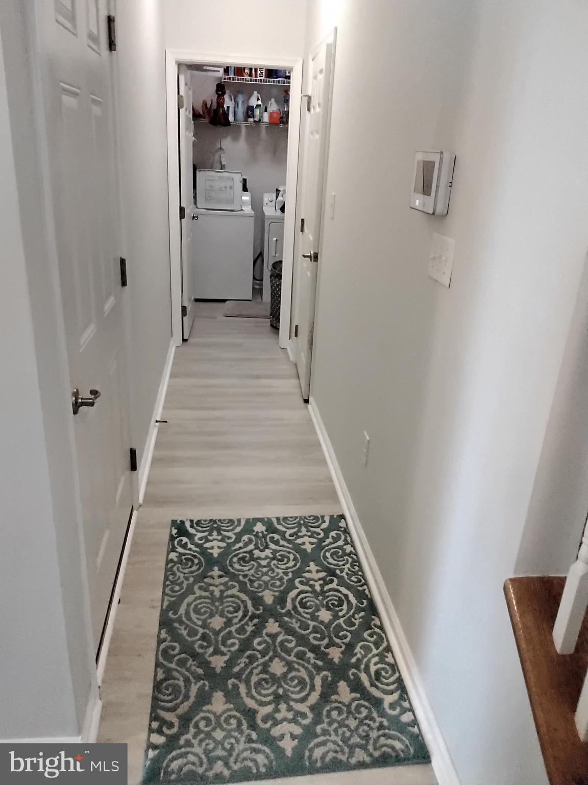 188 Bobbys Branch Road, Unit 50 Millsboro, DE 19966 - Photo 42 of 59 Hallway to Laundry & Garage