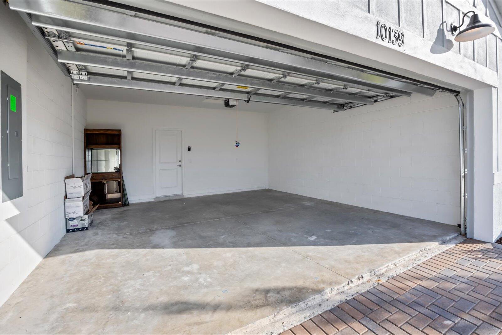 10139 Dreamweaver Road Port St. Lucie, FL 34987 - Photo 27 of 45 Garage