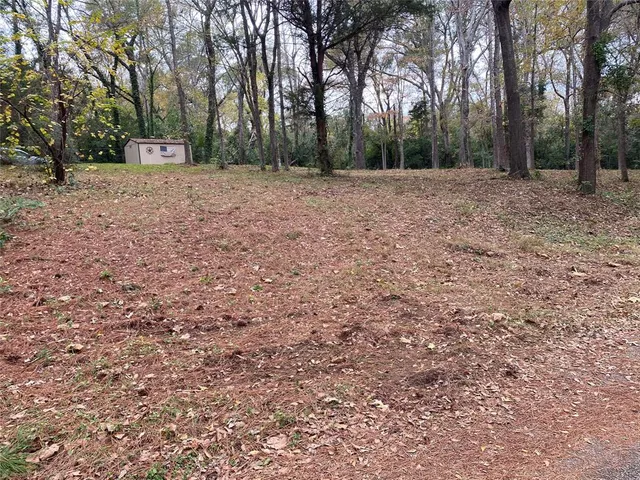 a view of open space with trees