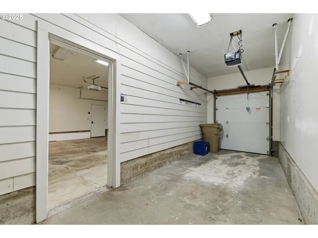 a view of a house with porch and garden