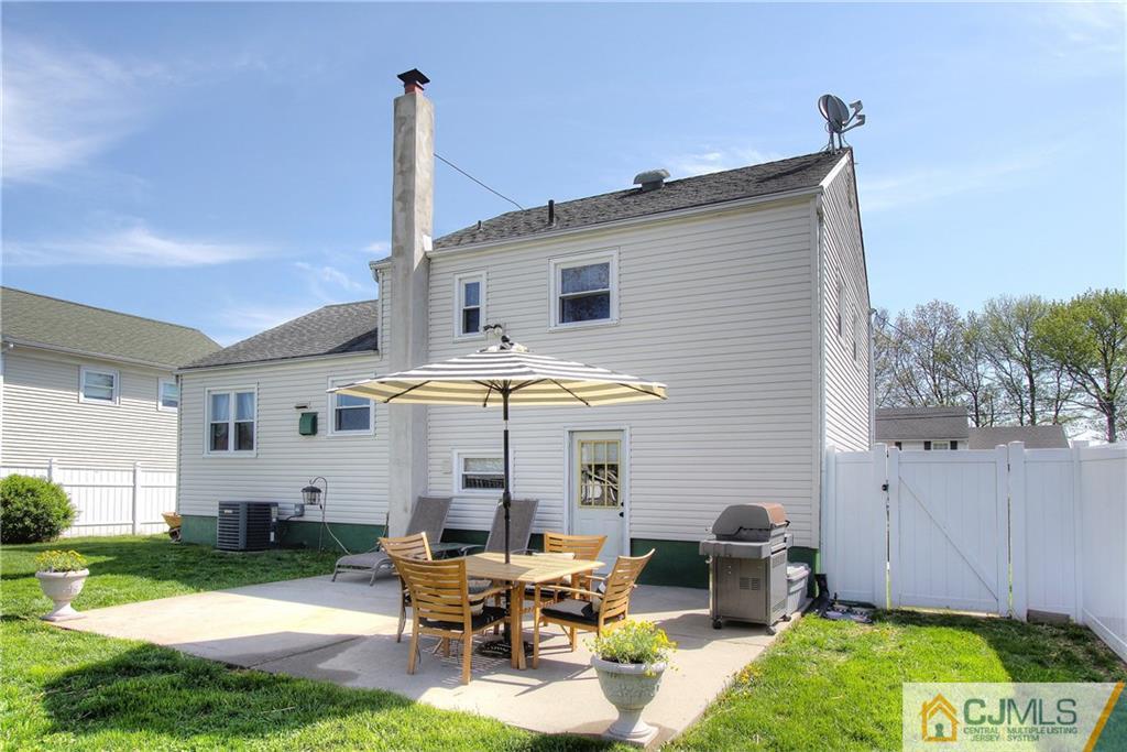 14 Wilshire Road Edison, NJ 08817 - Photo 22 of 22 a view of a house with backyard and sitting area
