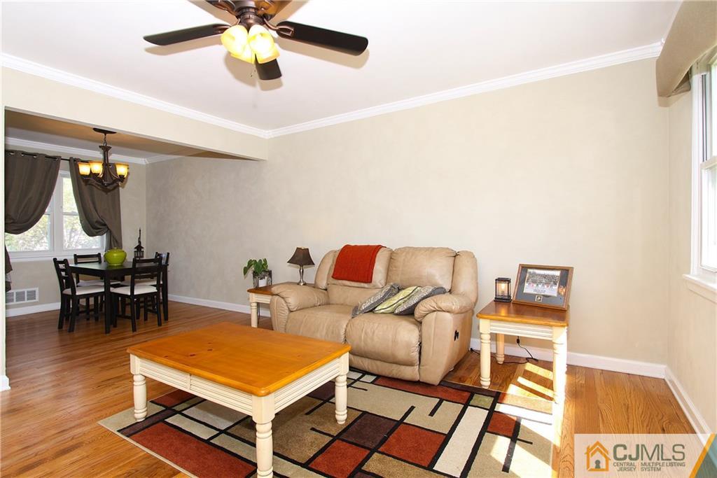 14 Wilshire Road Edison, NJ 08817 - Photo 5 of 22 a living room with furniture and wooden floor