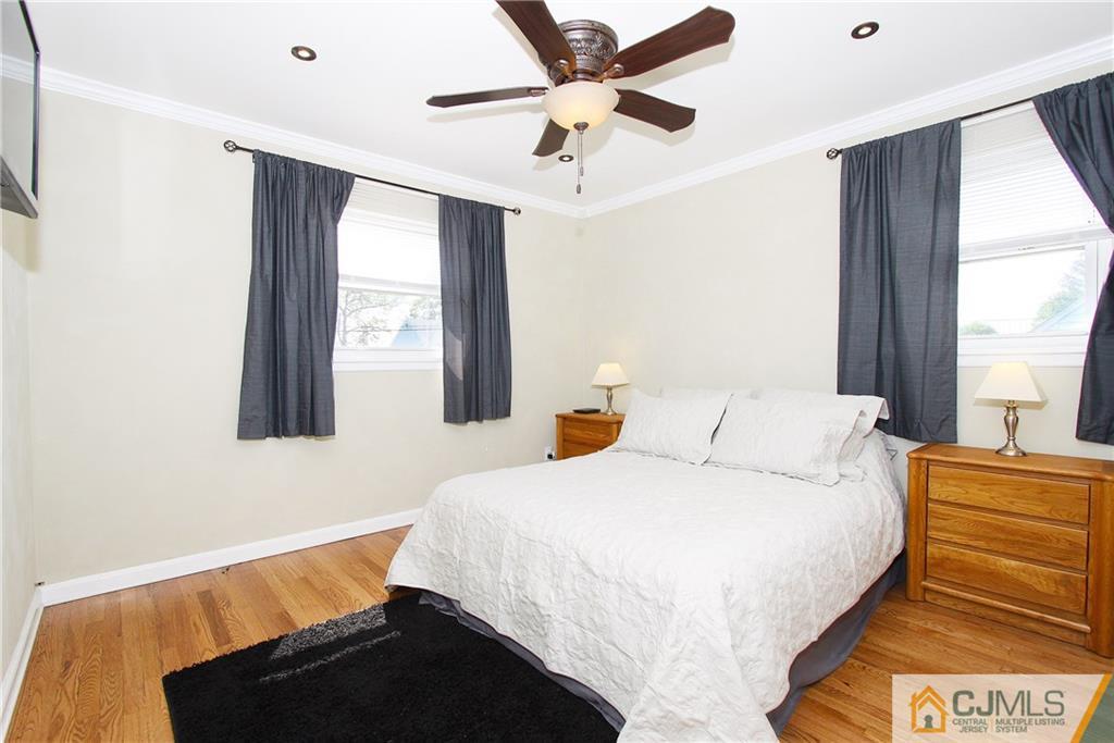 14 Wilshire Road Edison, NJ 08817 - Photo 10 of 22 a bedroom with a bed and a window