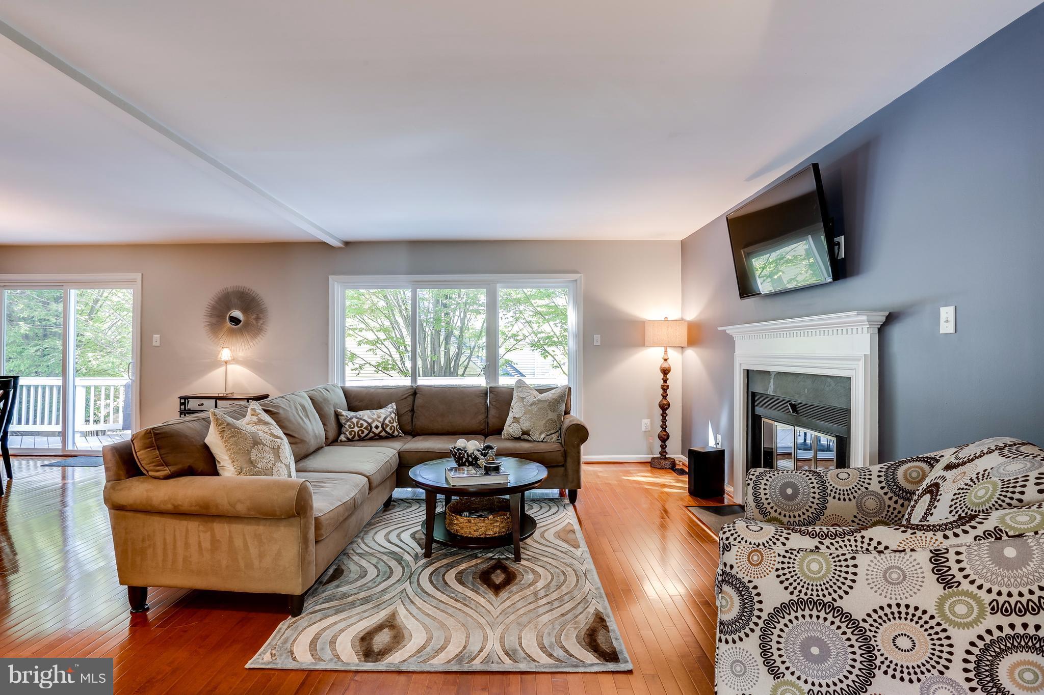 8241 Rippling Branch Road Laurel, MD 20723 - Photo 10 of 30 Family Room- Sliding Glass Door to Deck