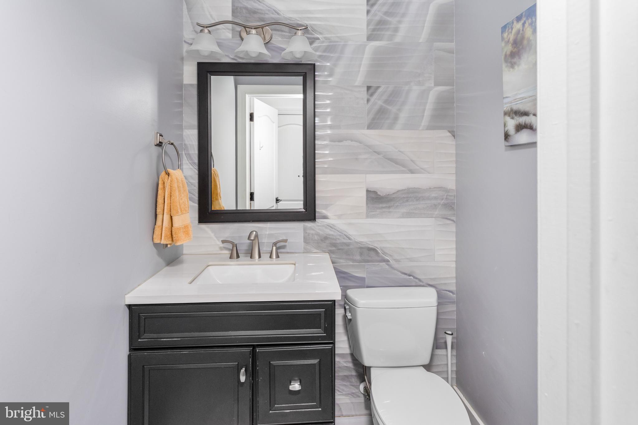 16 Meadow Run Road Bordentown, NJ 08505 - Photo 21 of 46 Sleek bathroom with modern elegance.