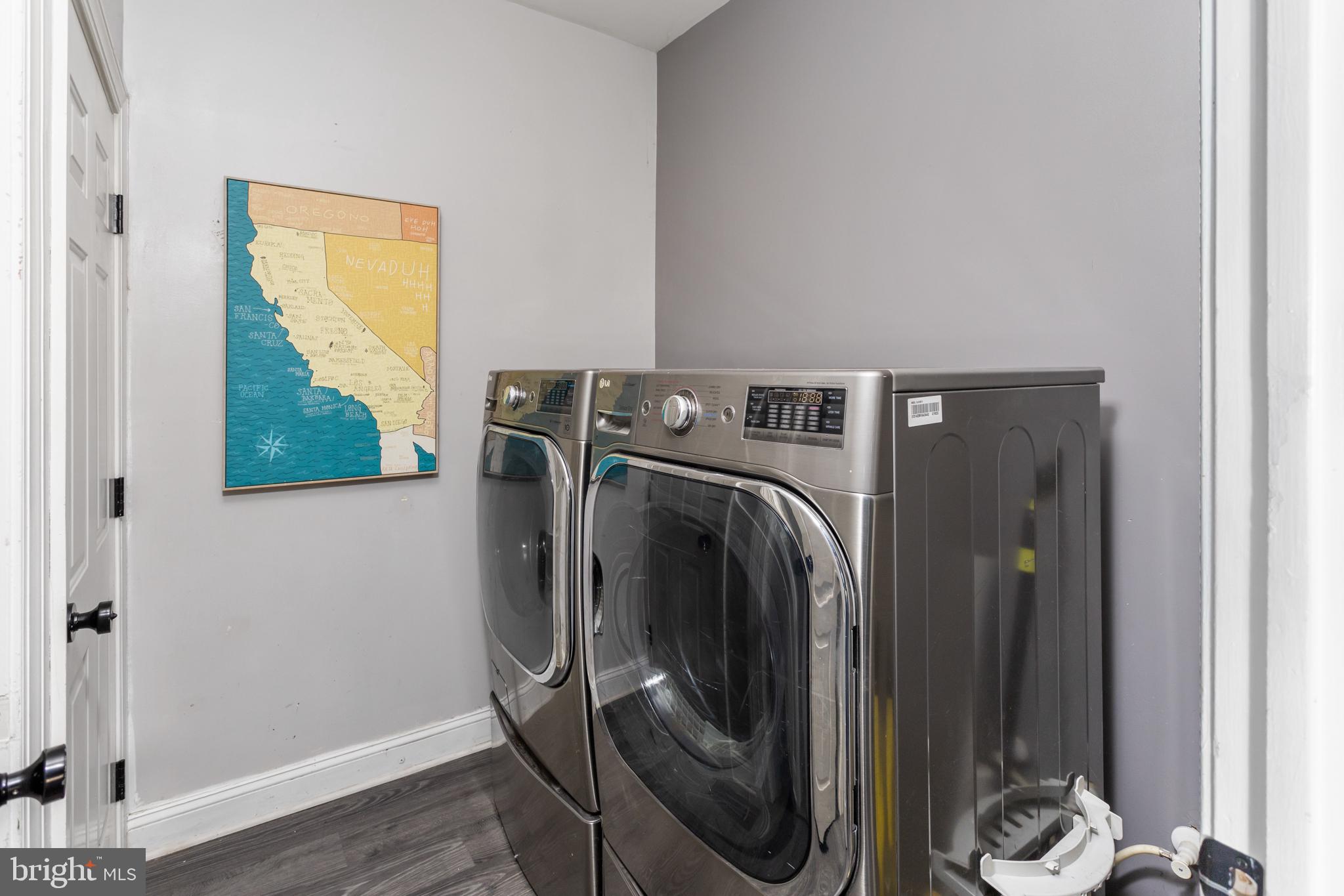 16 Meadow Run Road Bordentown, NJ 08505 - Photo 32 of 46 Sleek laundry space with artistic flair.